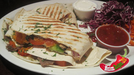 A plate of meat quesadillas